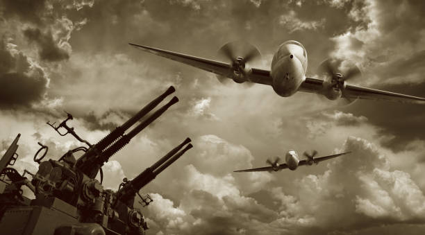 Flying Military Airplanes and Machine Guns  air attack stock pictures, royalty-free photos & images