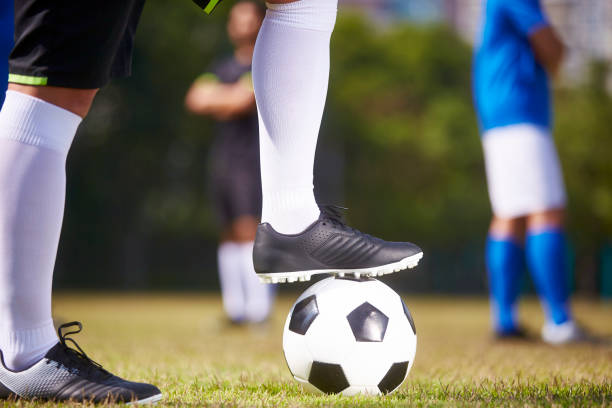 istock football player ready to kick off a match 1082738678
