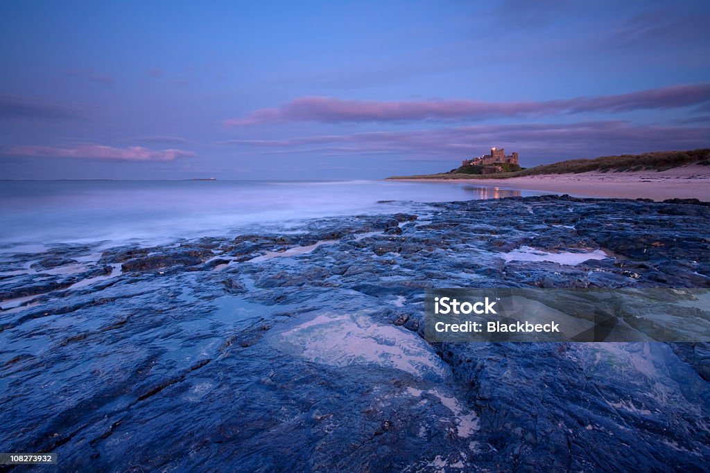 Bamburgh Castle bei Sonnenuntergang - Lizenzfrei Northumberland Stock-Foto