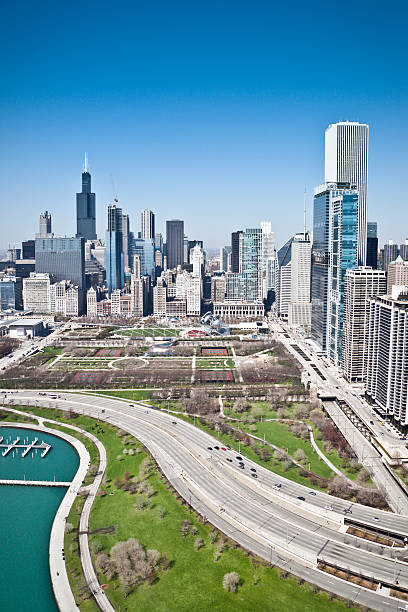 Cloudless Skyline of Chicago and Lake Shore Drive Aerial view of the Chicago skyline shot from a helicopter. lake shore drive chicago stock pictures, royalty-free photos & images