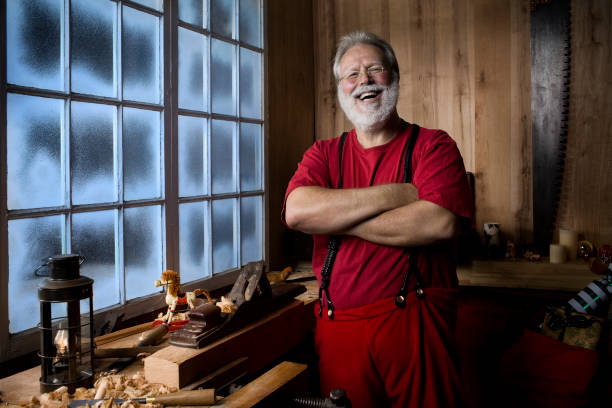 Cheerful Santa Claus Laughing in His Christmas Workshop, Copy Space