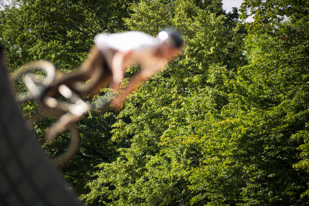 BMX Biker Performing Tricks during ride on a ramp