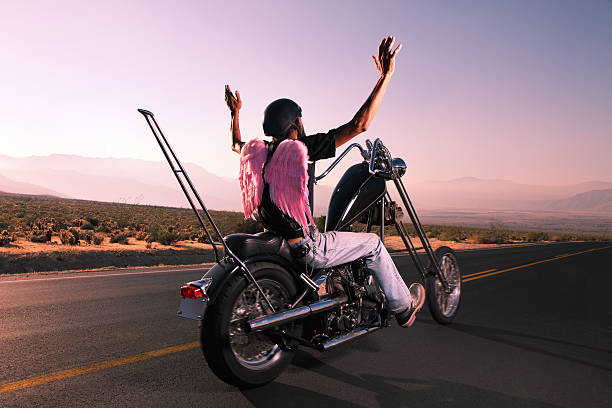 istock Motorcycle Biker on the Open Road with Angel Wings 108274406