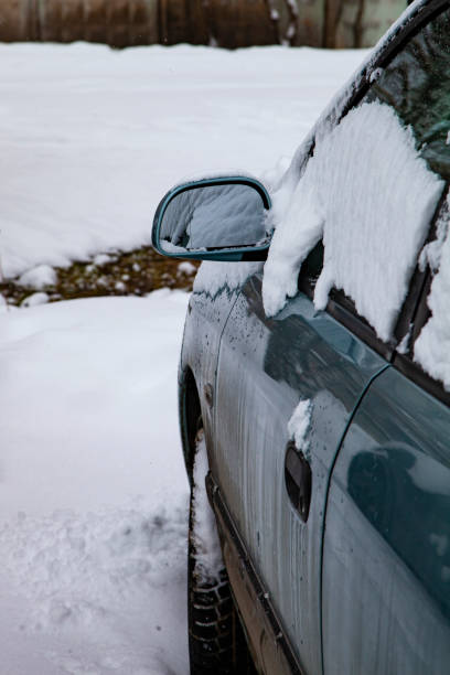 istock Car parked on a winter day. 1082746576