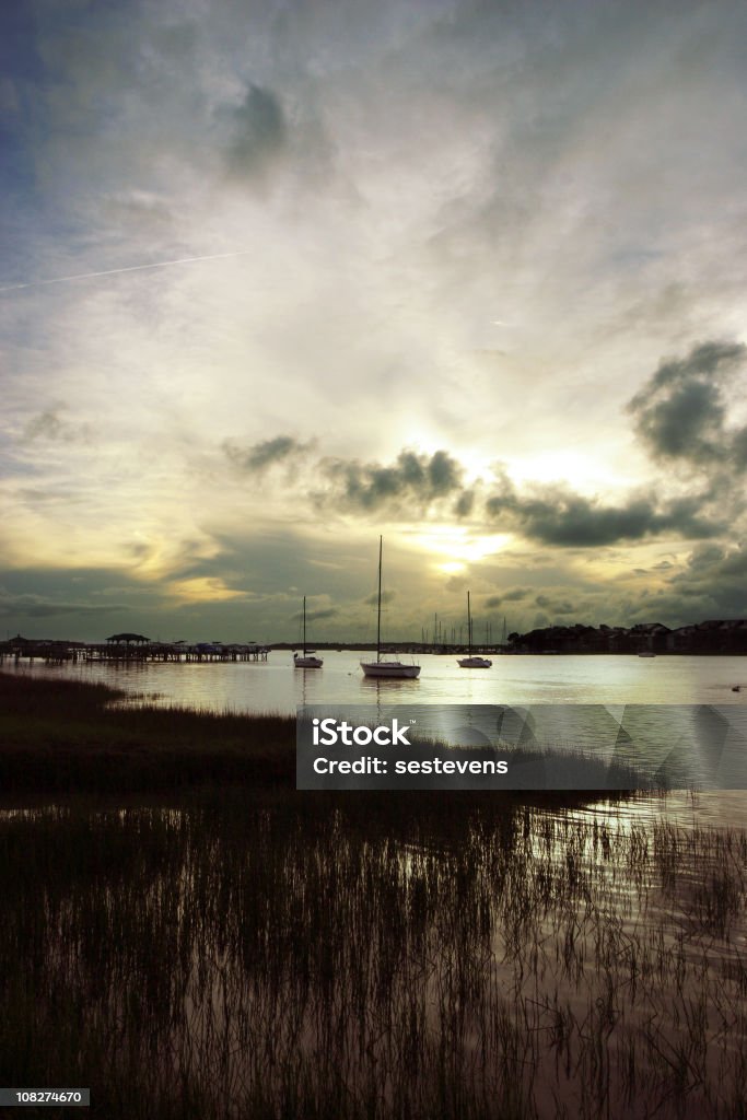 Pôr do sol no rio Folly - Foto de stock de Carolina do Sul royalty-free