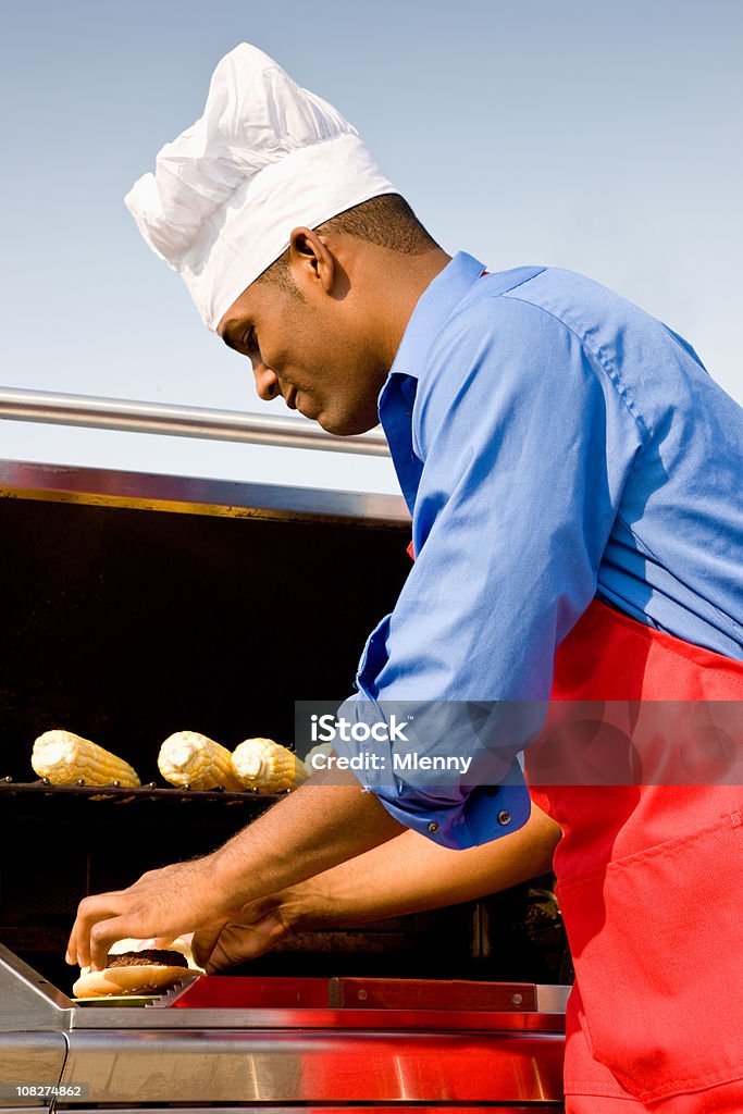 Man Cooking at Barbeque  African-American Ethnicity Stock Photo