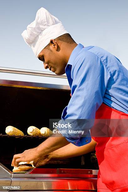 Man Cooking At Barbeque Stock Photo - Download Image Now - African-American Ethnicity, Barbecue Grill, Men