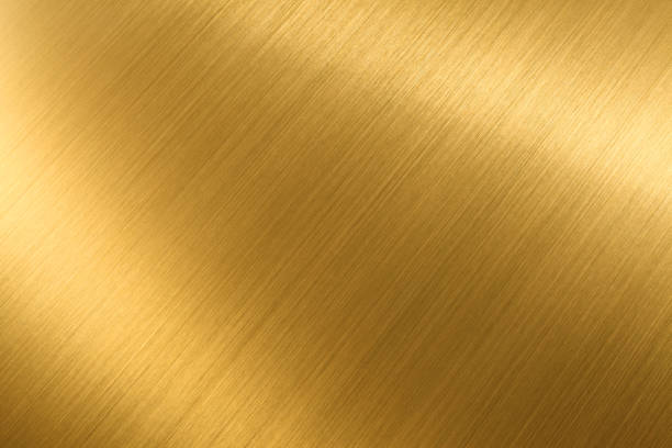 Gold shining texture background gold brushed metal texture or background gold metal stock pictures, royalty-free photos & images
