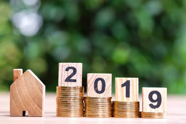 istock House and 2019 Block number on stack coins. 1082766500