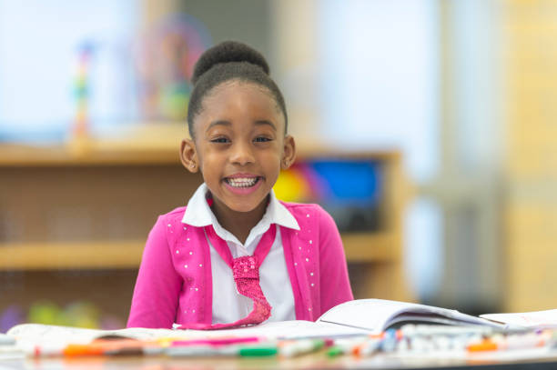 istock Young girl in kindergarten 1082766924