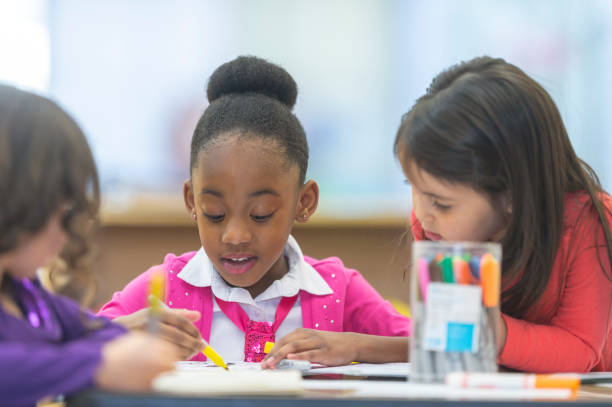 istock Kids coloring together 1082766966