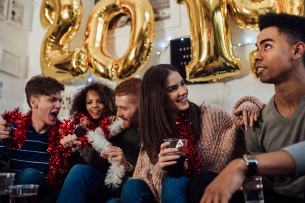 istock Happy friends celebrating New year 1082790040