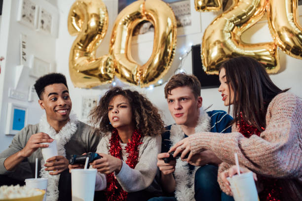 istock Young people playing video games 1082791296