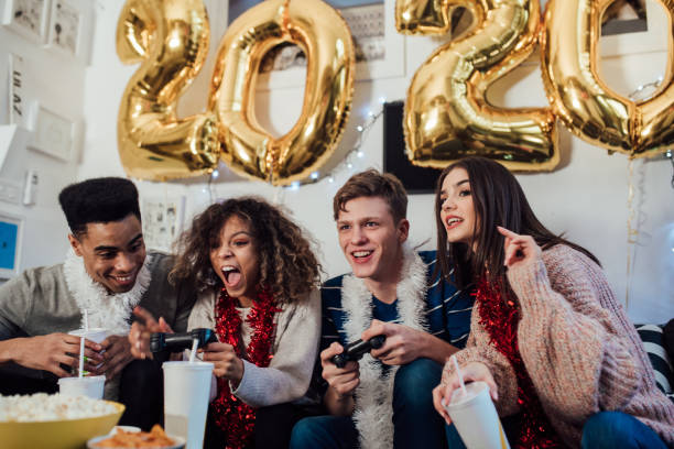 istock Teenagers playing video games 1082791484