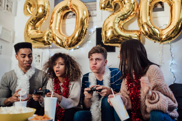 istock Young people playing video games 1082791544