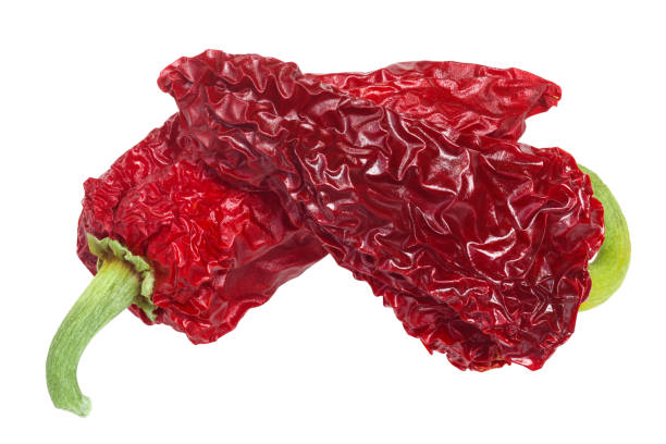 istock Dried Gorria Espelette short peppers, paths, top view 1082791940