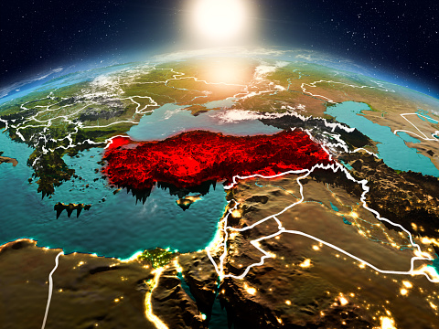Sunrise above Turkey highlighted in red on model of planet Earth in space with visible country borders. 3D illustration. Elements of this image furnished by NASA. 3D model of planet created and rendered in Cheetah3D software 25/09/2018. Some layers of planet surface use textures furnished by NASA, Blue Marble collection: http://visibleearth.nasa.gov/view_cat.php?categoryID=1484