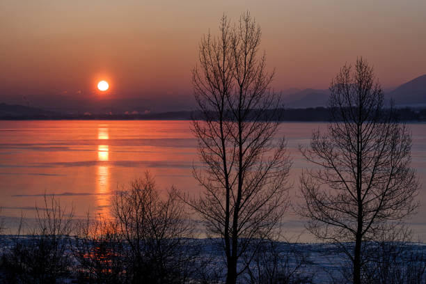 istock Sunrise and reflection on lake 1082812692