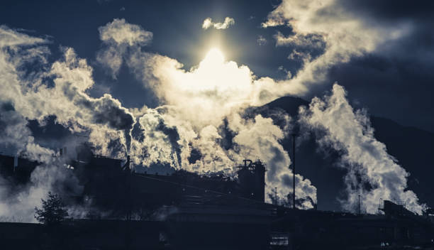 istock Smoking chimneys in factory 1082816524