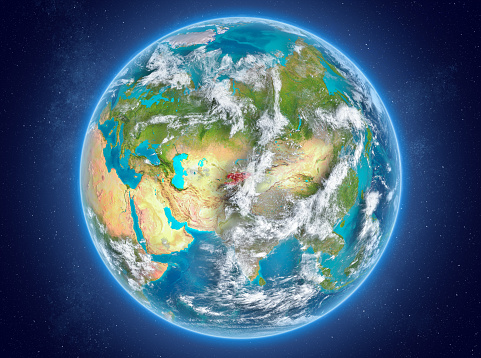 Kyrgyzstan in red on model of planet Earth with clouds and atmosphere in space. 3D illustration. Elements of this image furnished by NASA. 3D model of planet created and rendered in Cheetah3D software 25/09/2018. Some layers of planet surface use textures furnished by NASA, Blue Marble collection: http://visibleearth.nasa.gov/view_cat.php?categoryID=1484