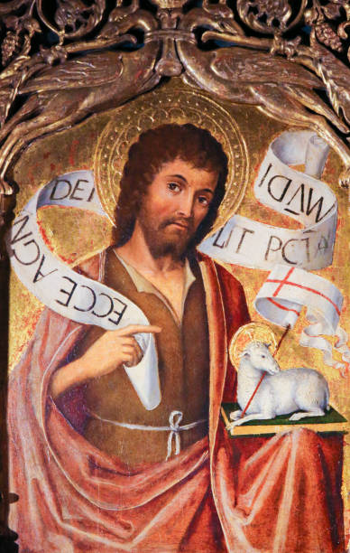 Saint John the Baptist - Agnus Dei Painting of Saint John the Baptist and the Agnus Dei on the Altarpiece of St Nicolas (1500) in the Cathedral of Monaco agnus dei stock pictures, royalty-free photos & images
