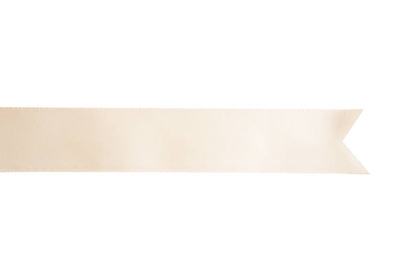 istock cream ribbon in roll on white background 1082827952