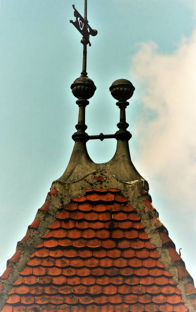 istock Spire with roof tiles and decoration 1082830082