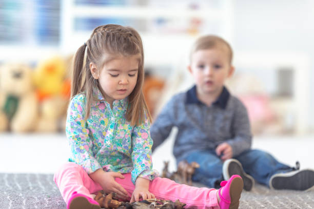 istock Playing with animal toys 1082830820
