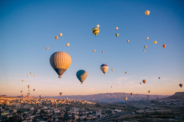 istock lots colorful balloons in sky above mountains 1082832700
