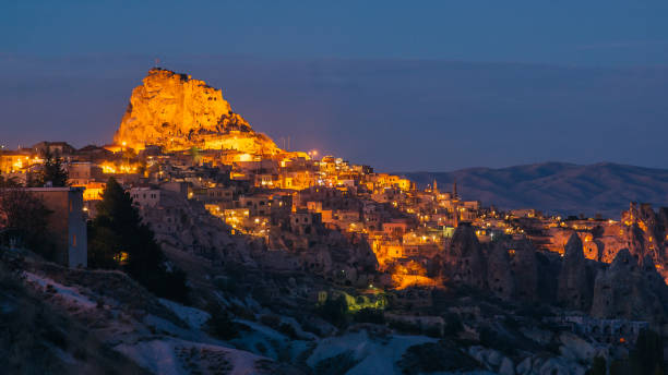 istock panorama of night city Uchisar 1082832728