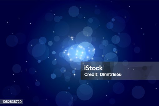 istock Abstract particle bokeh dark blue background 1082838720