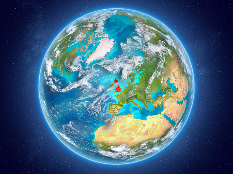 United Kingdom in red on model of planet Earth with clouds and atmosphere in space. 3D illustration. Elements of this image furnished by NASA. 3D model of planet created and rendered in Cheetah3D software 25/09/2018. Some layers of planet surface use textures furnished by NASA, Blue Marble collection: http://visibleearth.nasa.gov/view_cat.php?categoryID=1484