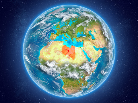 Libya in red on model of planet Earth with clouds and atmosphere in space. 3D illustration. Elements of this image furnished by NASA. 3D model of planet created and rendered in Cheetah3D software 25/09/2018. Some layers of planet surface use textures furnished by NASA, Blue Marble collection: http://visibleearth.nasa.gov/view_cat.php?categoryID=1484