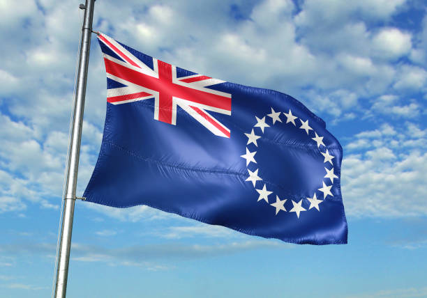 istock Cook Islands flag waving cloudy sky background 1082842616