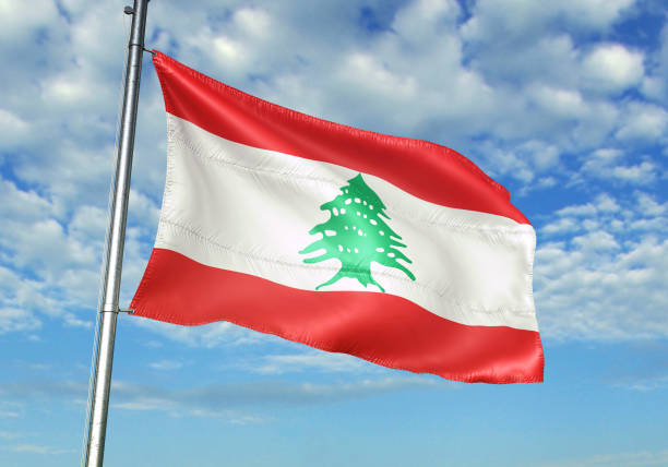 istock Lebanon  flag waving cloudy sky background 1082843996
