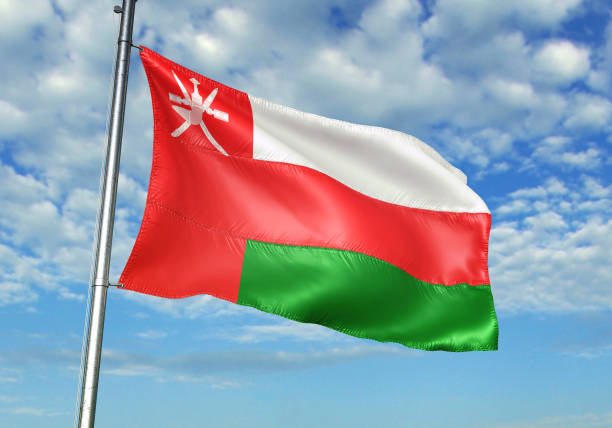 Oman flag on flagpole waving cloudy sky background realistic 3d illustration