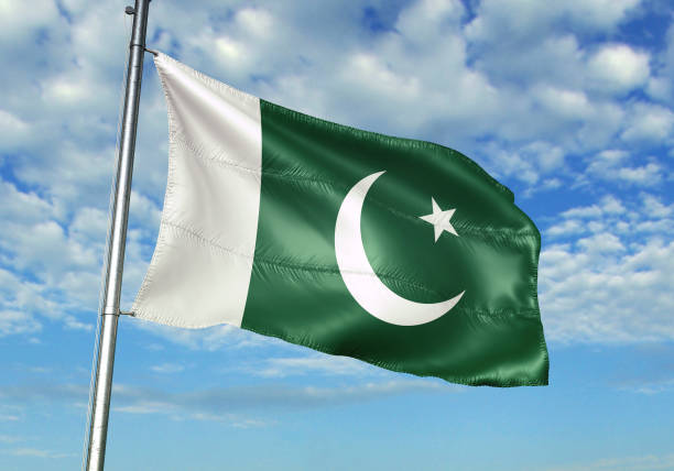 istock Pakistan flag waving cloudy sky background 1082844364