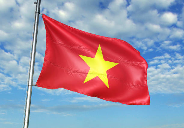 istock Vietnam flag waving cloudy sky background 1082847528