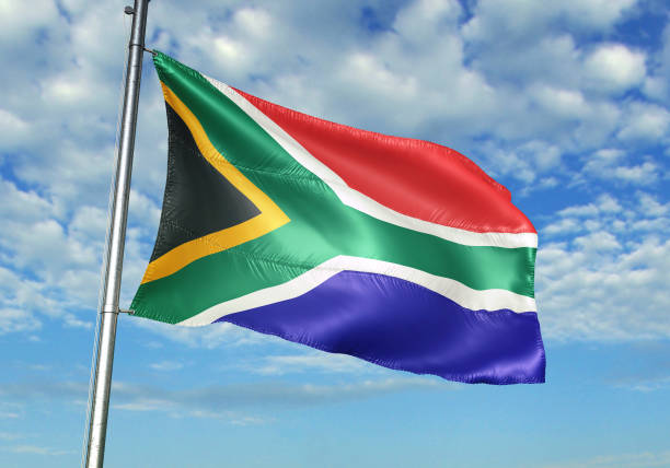 istock South Africa flag waving cloudy sky background 1082847686