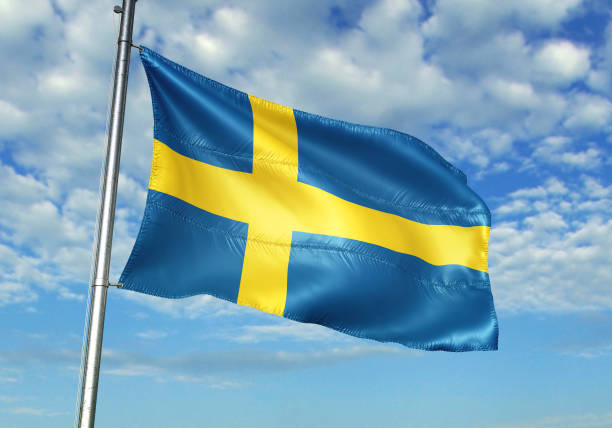 sweden flag waving cloudy sky background - day sky swedish flag banner imagens e fotografias de stock