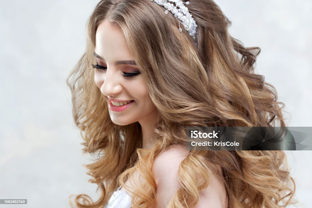Charming Young Bride With Luxury Hairstyle Beautiful Woman In Wedding Dress Hairstyle With Fluffy Curls Stock Photo - Download Image Now - iStock Charming Young Bride With Luxury Hairstyle Beautiful Woman In Wedding Dress Hairstyle With Fluffy Curls Stock Photo - Download Image Now - iStock