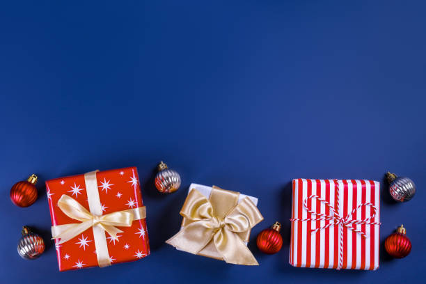 istock Many different christmas and new years presents in colorful wrapping. 1082858850