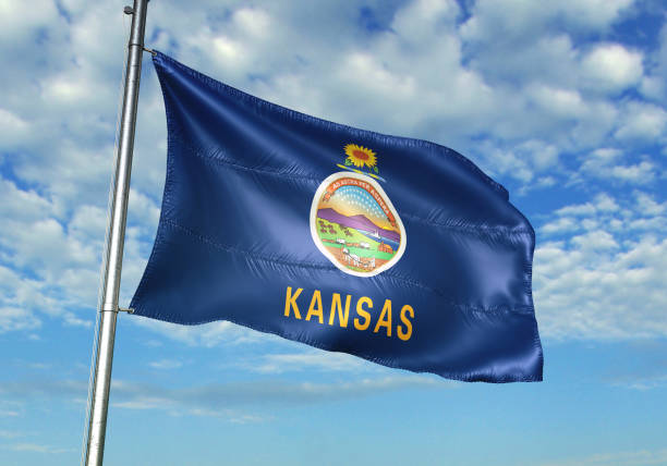 Kansas state of United States flag waving cloudy sky background Kansas state of United States flag on flagpole waving cloudy sky background realistic 3d illustration kansas stock pictures, royalty-free photos & images