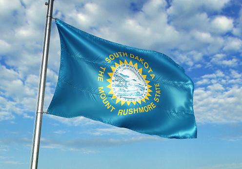 South Dakota state of United States flag on flagpole waving cloudy sky background realistic 3d illustration