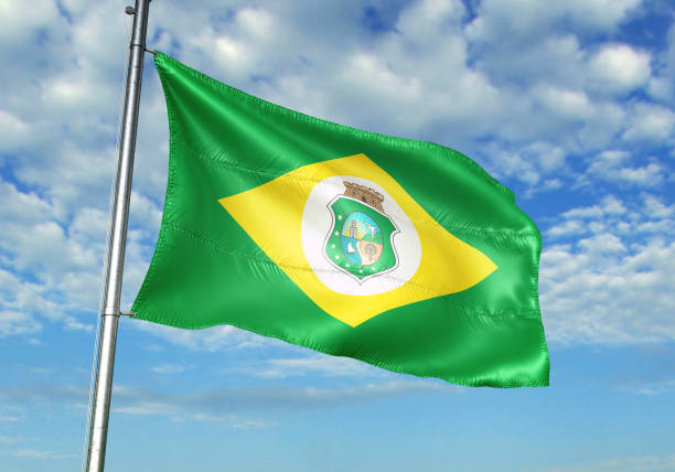 istock Ceara state of Brazil flag waving cloudy sky background 1082862342