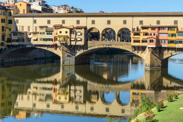 istock Ponte Vecchio Bridge over river Arno at sunny day. Florence. Italy 1082862956