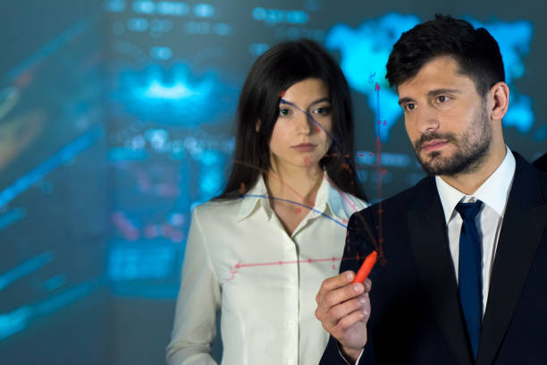 istock The man and woman drawing on the virtual board 1082863660