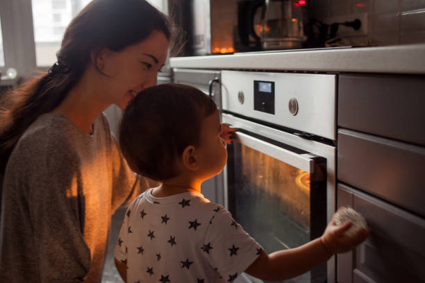 istock young multiethnic family making a cake together 1082863796