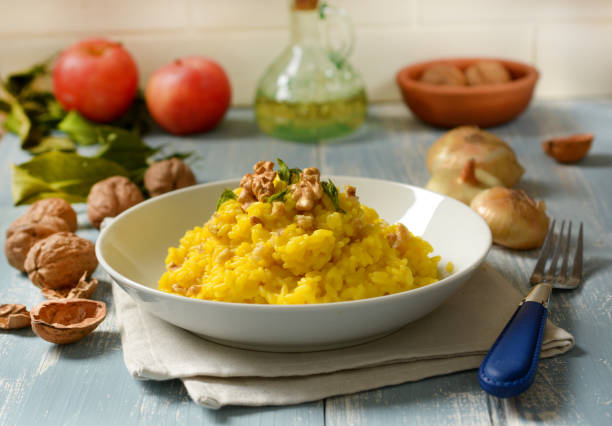 istock risotto with saffron and walnuts - closeup 1082866522
