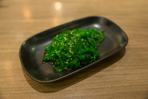 istock Seaweed and chopsticks in focus selective. 1082868066